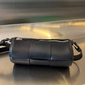 BOTTEGA VENETA SMALL CYLINDER CASSETTE 21 IN BLACK CALFSKIN