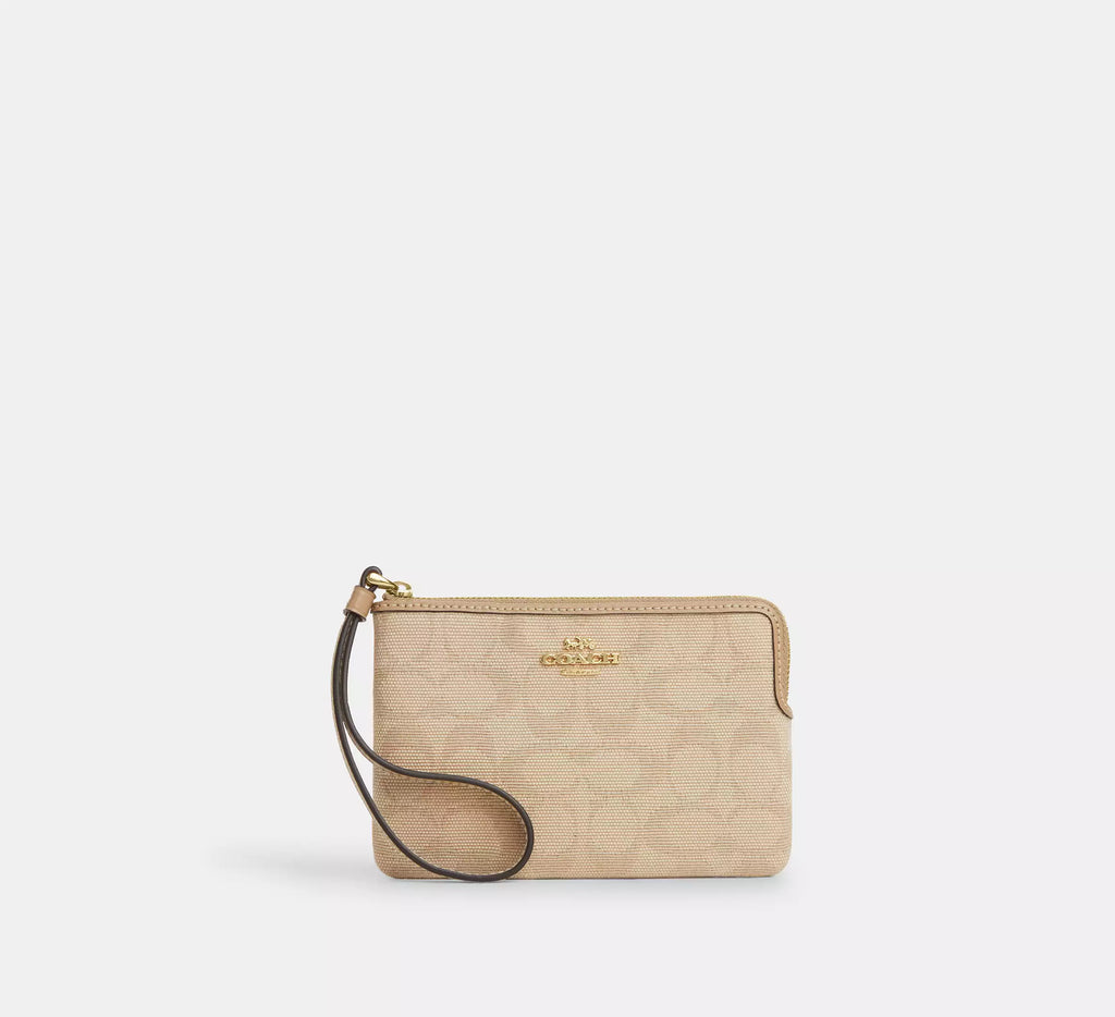 Coach Corner Zip Wristlet In Signature Canvas With Stripe