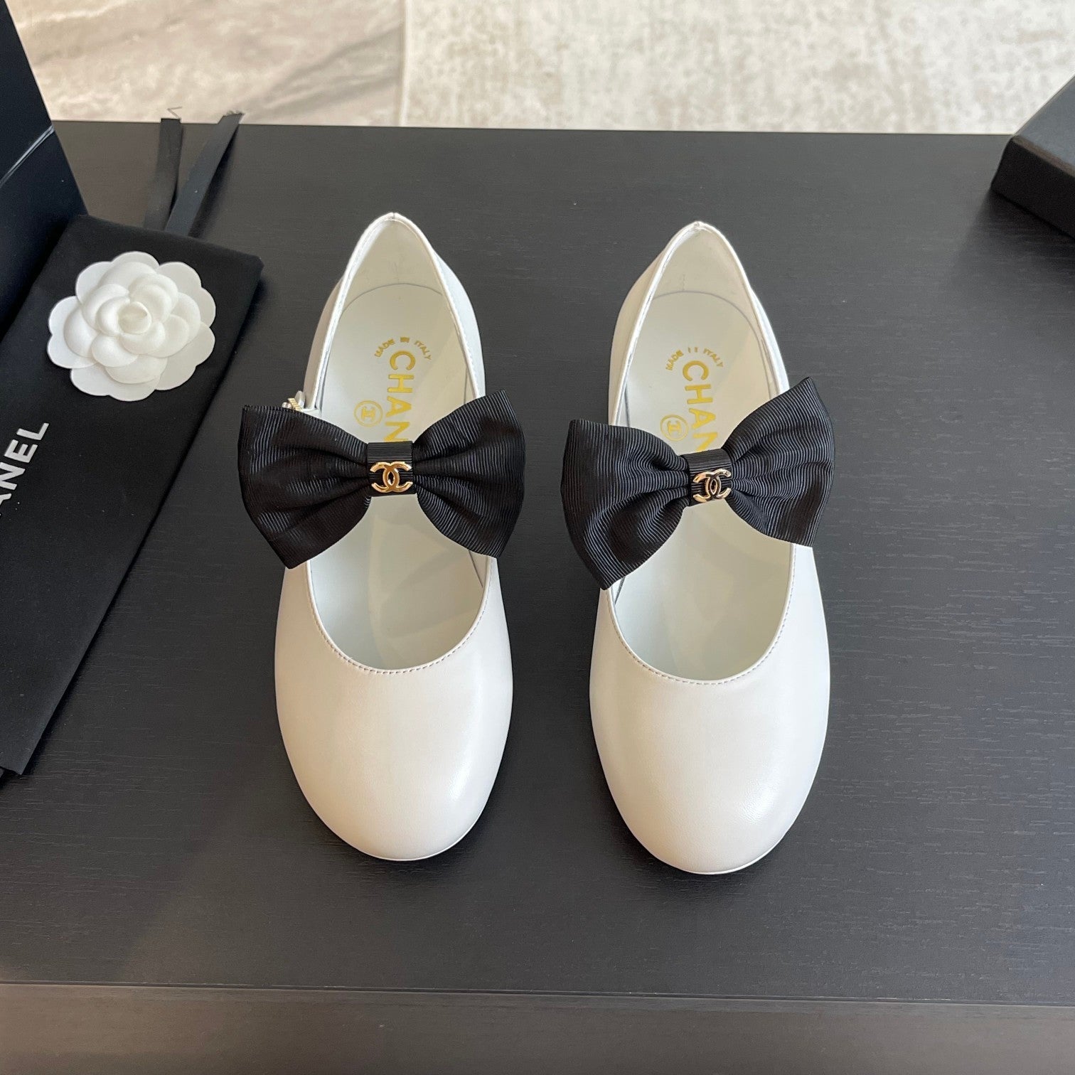 CHANEL BALLET FLAT WHITE LAMBSKIN WITH BLACK BOW